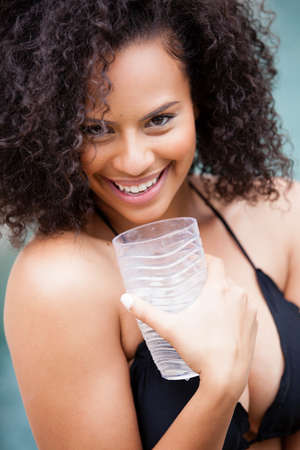 Pretty woman smiling in a Bikiniの写真素材