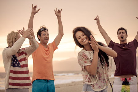 Young people celebrating at Venice Beach in Summer