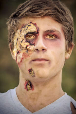 Teenager Zombie Portrait with decaying skin affectsの写真素材