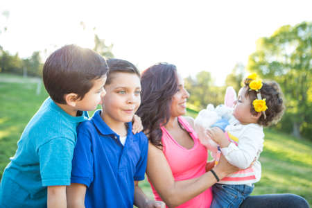 Family at the park on Easterの写真素材