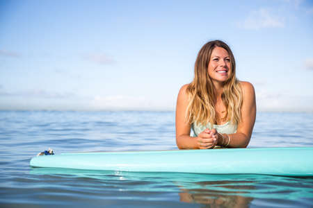 SUP Yoga Instructor on the water in Hawaiiの写真素材