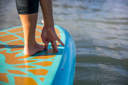 SUP yoga isolated select focus of foot and handの写真素材