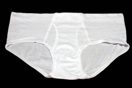 white men underwear on black backgorundの写真素材
