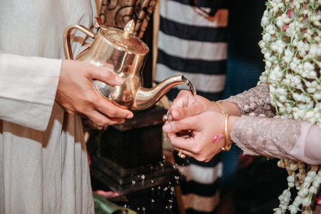 close up of a person pouring water for purificationの写真素材