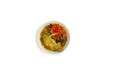 Indonesian famous street food Soto Ayam : Soto is a traditional Indonesian soup mainly composed of broth, chicken and vegetables.の写真素材