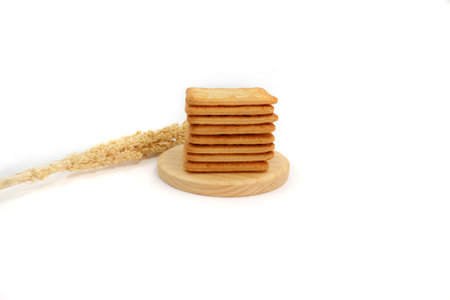 Sugar coated biscuits, sugarless healthy malkist cracker biscuits on white background isolatedの写真素材