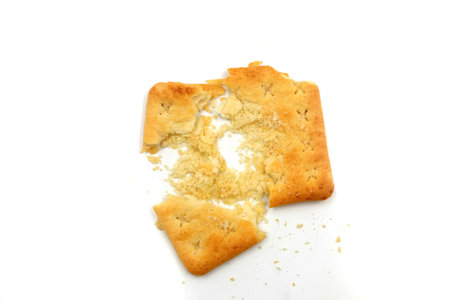 crush biscuits, sugarless healthy malkist cracker biscuits on white background isolatedの写真素材