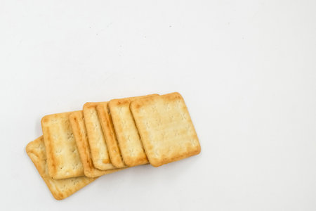 Sugar coated biscuits, sugarless healthy malkist cracker biscuits on white background isolatedの写真素材