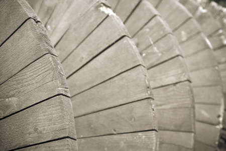 A close-up shot of a wooden archimedes screw previously used in a windmillの写真素材