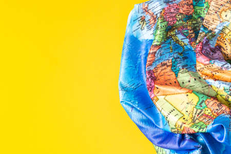 Top view part of the world map, European countries, African countries on a yellow background. Flat lay. Copy space. World map Russian languageの写真素材