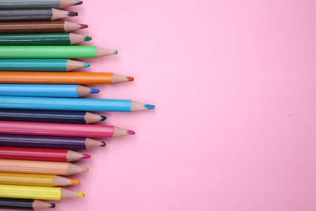 Close up of color pencil set on pink backgroundの写真素材