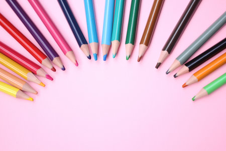Close up of color pencil set on pink background