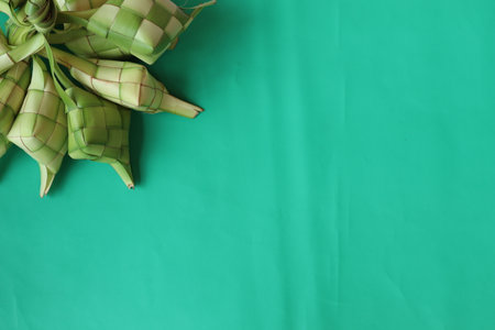Ketupat or rice dumpling is traditional asian food usually used for Islamic holiday celebrations such as Eid al-Fitr and Hajj Eidの写真素材