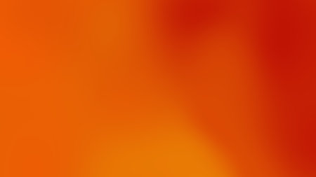 Blurred gradient background of vibrant orange and red colors