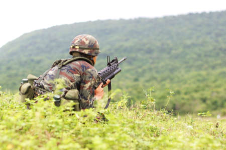 Soldiers in uniform of the Thai Army on the Gunnery drillsの写真素材