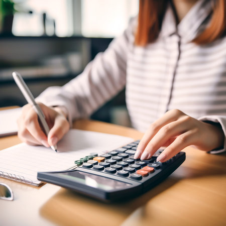 Modern AI-Generated Woman Working with Calculator in Office - Business Finance and Technology Conceptの素材