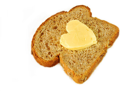 wholegrain bread and heart shaped butter