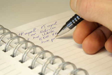 Notebook and the writing of the information.
