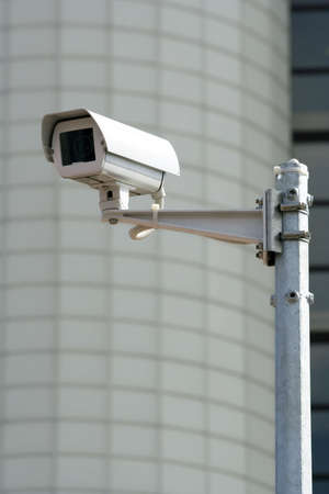  CCTV security camera  before a municipal building.の写真素材