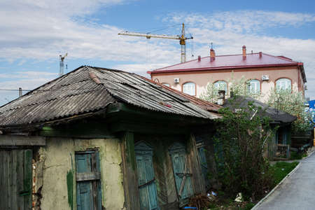 Architectural contrasts of modern Siberian city.の写真素材
