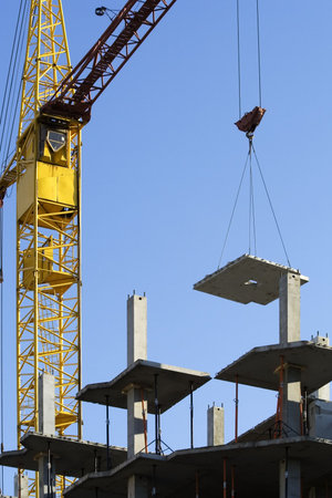 The crane and a new building.