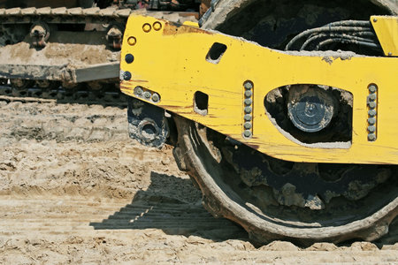Steam roller on construction of road.