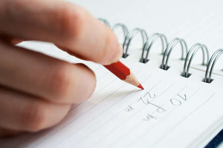 Female hand writing.の写真素材