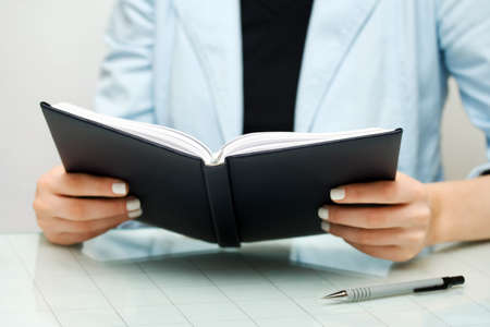 Businesswoman reading.の写真素材