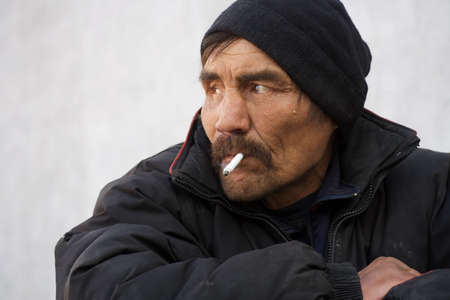 Smoking homeless.の写真素材