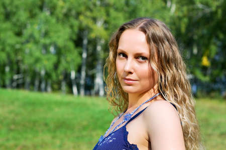 Beautiful woman relaxing on nature.の写真素材