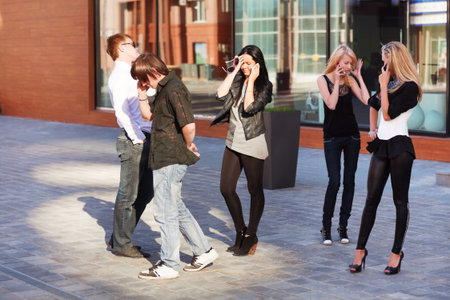 Young people calling on the mobile phones