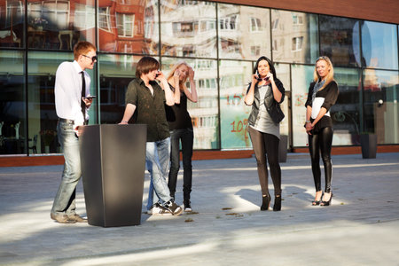 Young people calling on the mobile phones