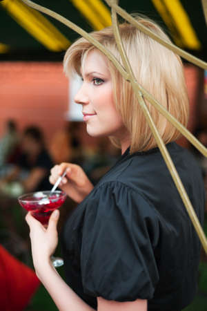 Young woman eating a dessertの写真素材