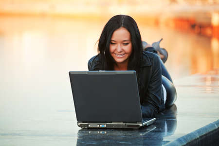 Young woman working on laptopの写真素材