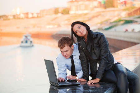 Young couple with laptopの写真素材