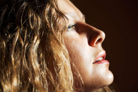 Sad beautiful woman looking awayの写真素材