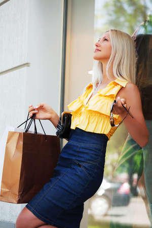 Young woman with shopping bagsの写真素材