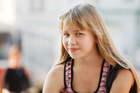 Teenage girl on a city streetの写真素材