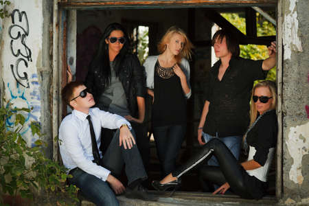 Young people at abandoned apartmentの写真素材