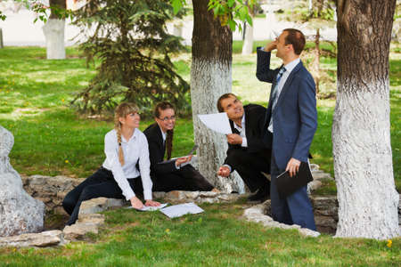 Young business people in a city parkの写真素材