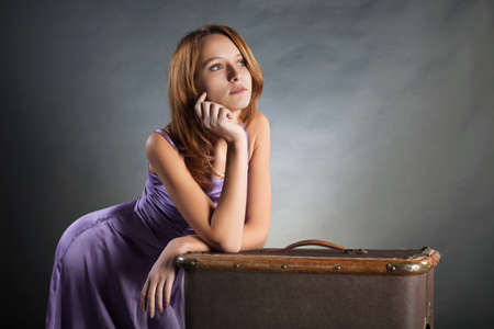 Young woman with a suitcaseの写真素材