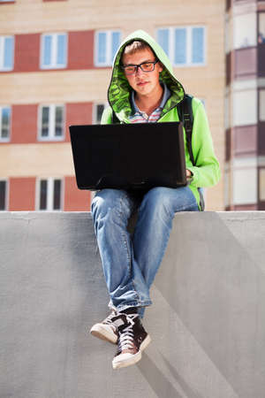 Young student using laptopの写真素材
