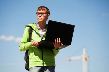 Young student using laptopの写真素材