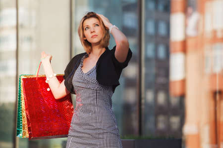Young woman with shopping bagsの写真素材