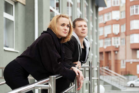 Happy young couple on the city streetの写真素材