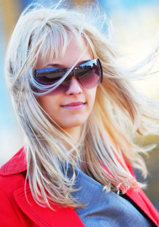 Young blond woamn in sunglassesの写真素材