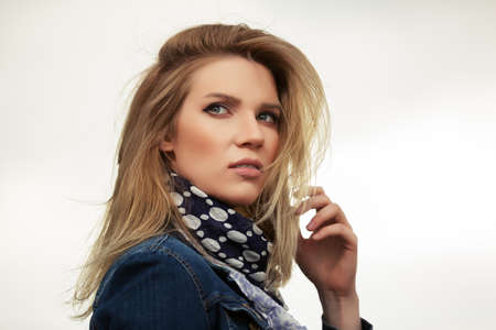 Portrait of happy young fashion woman outdoorの写真素材