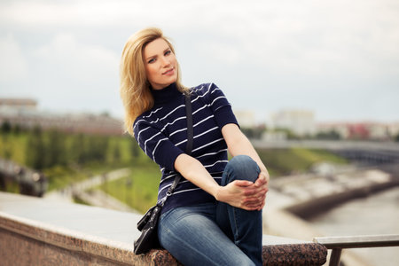 Portrait of happy young fashion woman outdoor