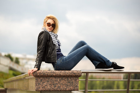 Portrait of happy young fashion woman outdoor