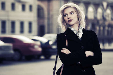 Young fashion woman on the city streetの写真素材